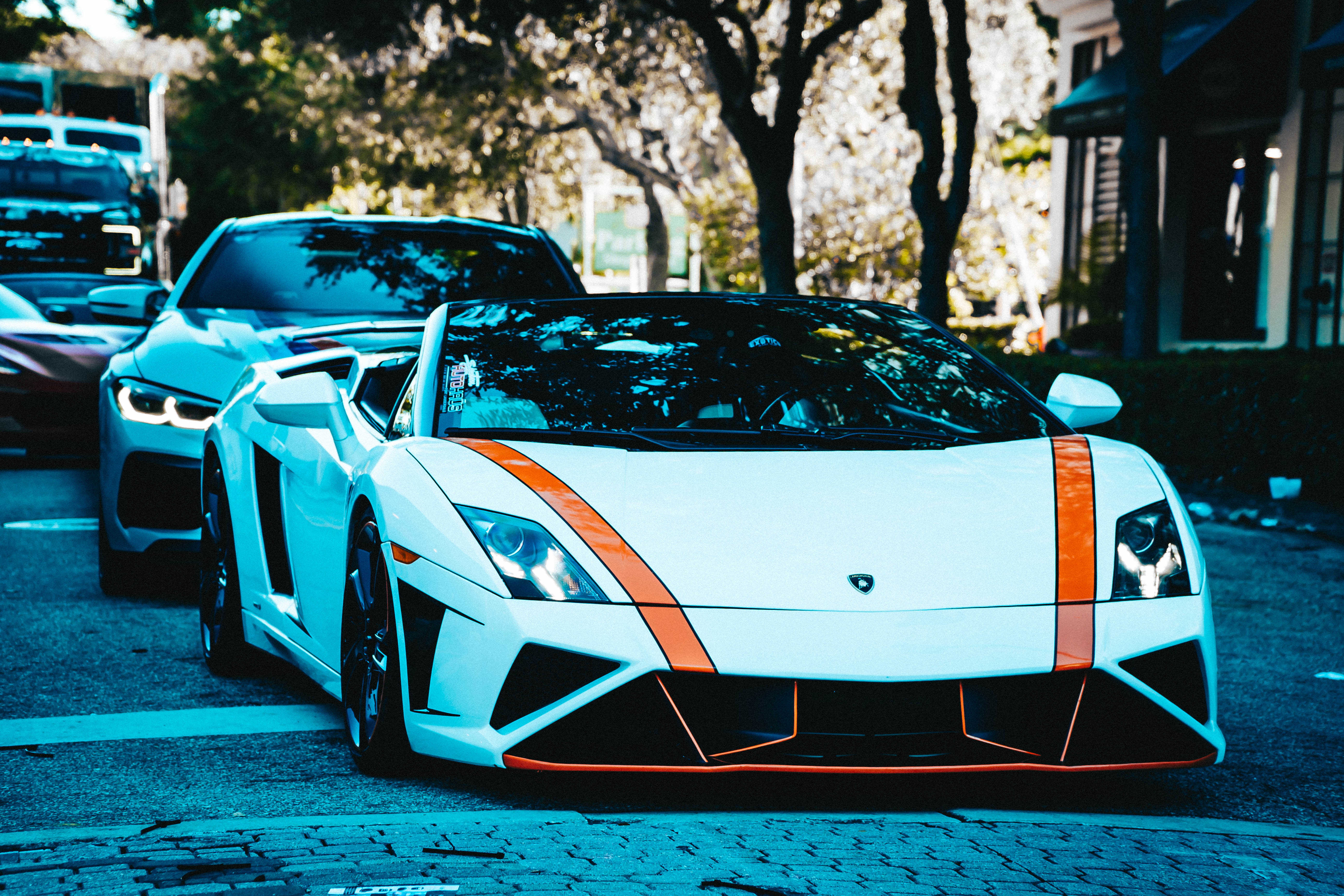 White Lamborghini Gallardo with orange stripes